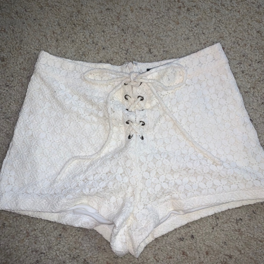 Off-white lace up shorts